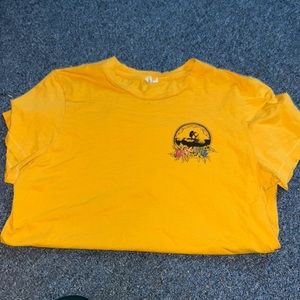 yellow women’s rip curl tee